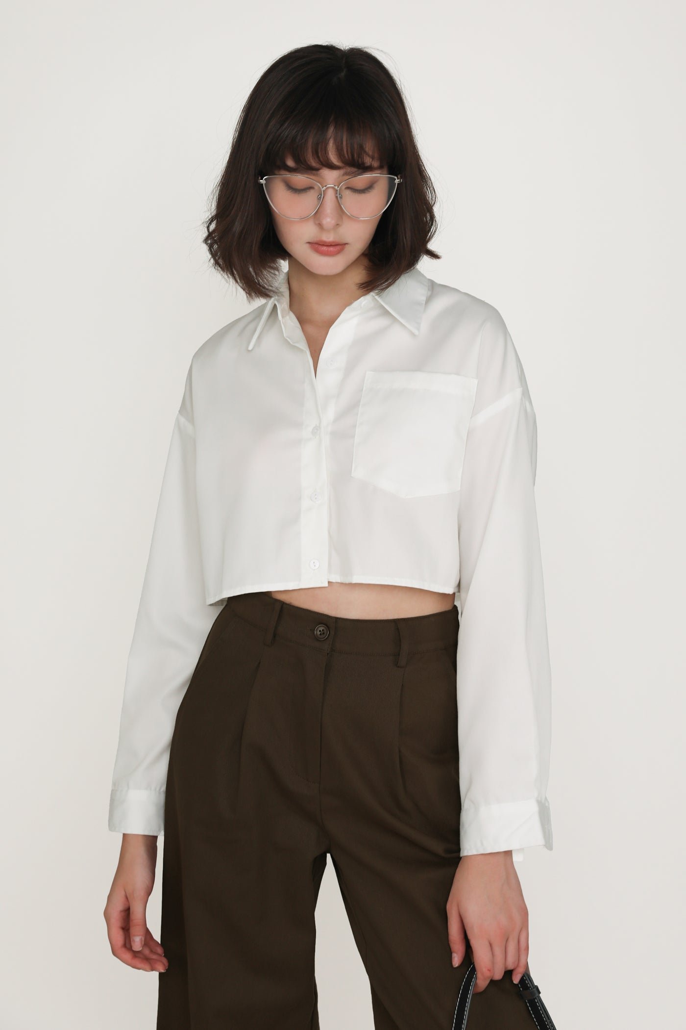 sylvie-white-cropped-shirt-image-3-the-tinsel-rack-singapore_df7ef4b1-a353-4ae6-8c21-0158c0368df0 Sylvie Cropped Shirt - Image 1